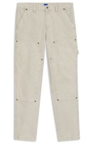 Pantalon Tapered en toile de coton - HUGO - Modalova