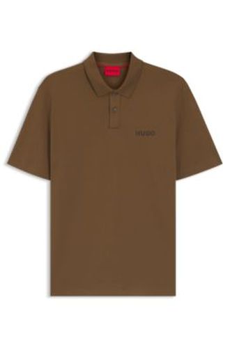 Polo en piqué de coton avec logo appliqué - HUGO - Modalova