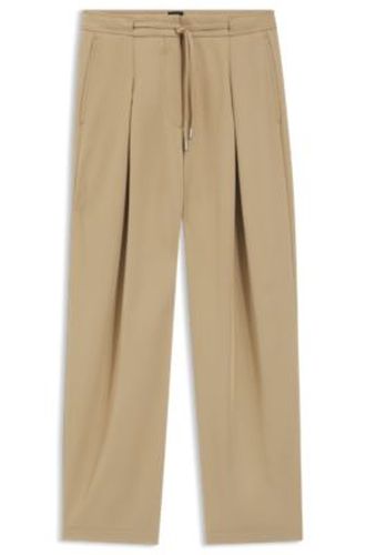 Pantalon coupe fuselée avec plis sur le devant - Boss - Modalova