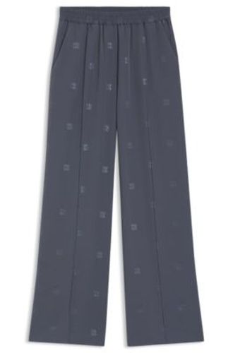 Pantalon Relaxed à logos revisités - HUGO - Modalova