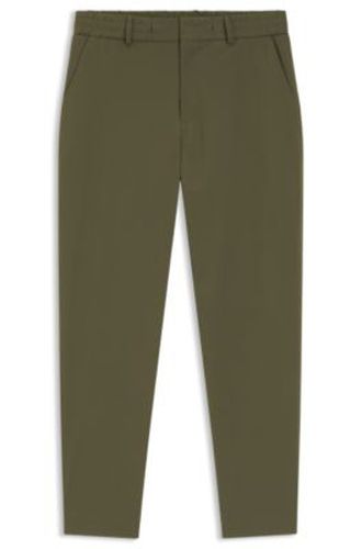 Pantalon Tapered en tissu stretch performant - Boss - Modalova
