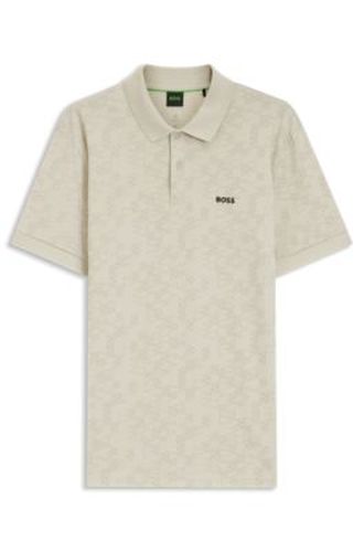 Polo en piqué de coton avec motif imprimé partout - Boss - Modalova