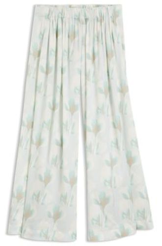 Pantalon large Oversized Fit à imprimé à fleurs - Boss - Modalova