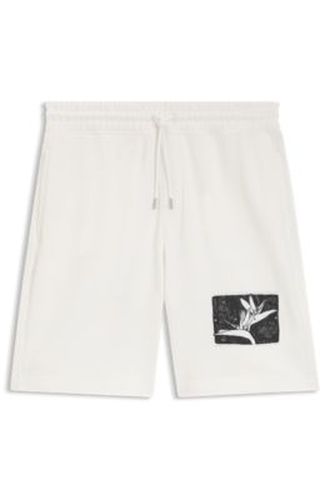 Short en molleton de coton avec écusson artistique - HUGO - Modalova