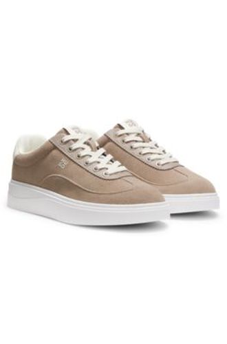 Baskets en cuir suédé avec logos superposés - HUGO - Modalova