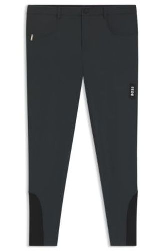 Pantalon d’équitation en tissu power-stretch à empiècements agrippants au niveau des genoux - Boss - Modalova