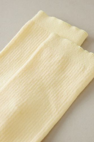 Chaussettes basses en coton bio en Yellow, chez Anthropologie - Colorful Standard - Modalova