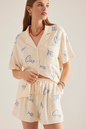 Chemise de surf en lin mélangé brodé blanc plat par taille: XS/tp chez Anthropologie - Flat White - Modalova