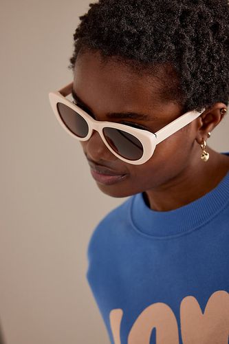 Les lunettes de soleil papillon polarisées Fleur en Beige - Par Anthropologie - Modalova