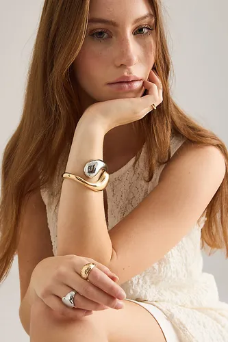 Bracelet manchette croisé en métal mixte par - By Anthropologie - Modalova