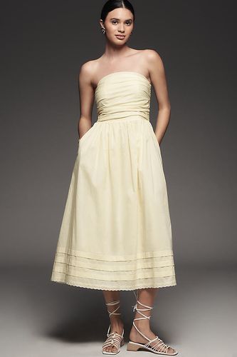 Robe mi-longue plissée sans bretelles en coton en Yellow taille: XS chez Anthropologie - WAYF - Modalova