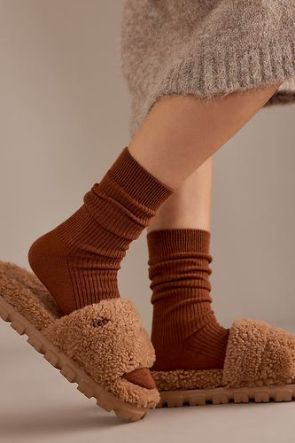 Mules pantoufles en peau de mouton bouclée Cozetta en Brown taille: 36 chez Anthropologie - UGG - Modalova