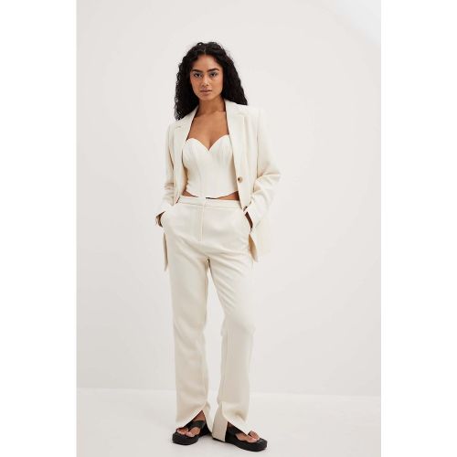 Pantalon ajusté à taille mi-haute et fentes sur les côtés - Offwhite - NA-KD Classic - Modalova