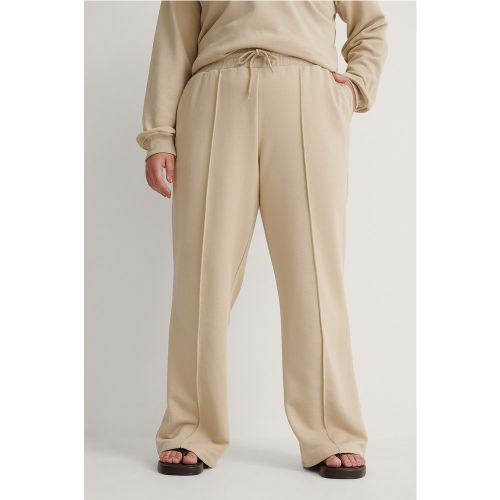 Pantalon de survêtement à coutures apparentes - Beige - NA-KD - Modalova