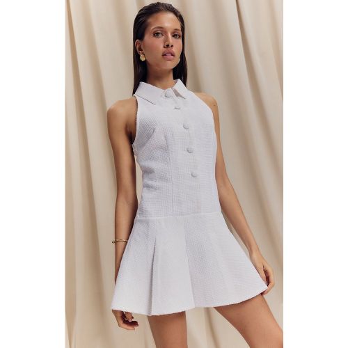 Robe patineuse bouclée blanche plissée - PrettyLittleThing - Modalova