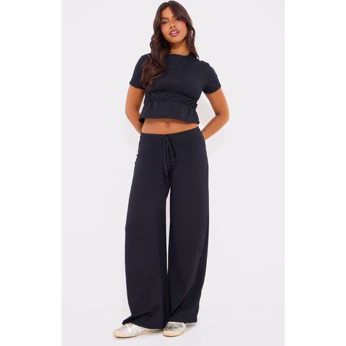 Pantalon large en coton noir, Noir - PrettyLittleThing - Modalova