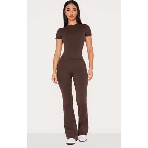 Petite Pantalon de yoga flare en Sculpt à taille haute - PrettyLittleThing - Modalova