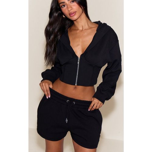 Petite Short tissé à logo brodé - PrettyLittleThing - Modalova