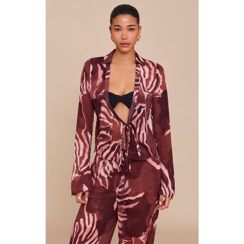 Chemise en mousseline de soie imprimé abstrait nouée devant à manches longues | Taille 34 - PrettyLittleThing - Modalova