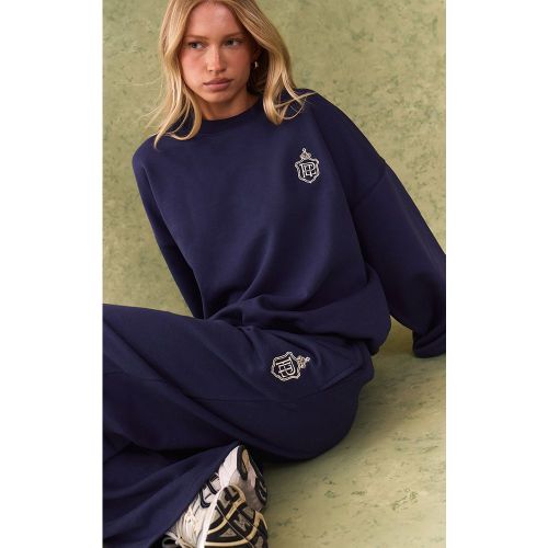 Jogging large à logo brodé - PrettyLittleThing - Modalova