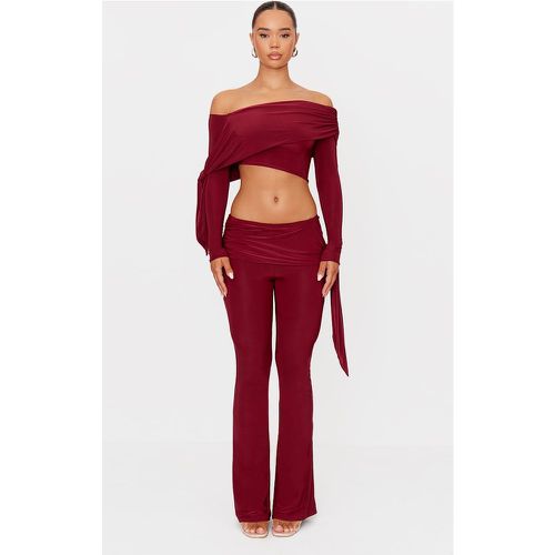 Pantalon flare froncé rouge cerise à détail noeud - PrettyLittleThing - Modalova