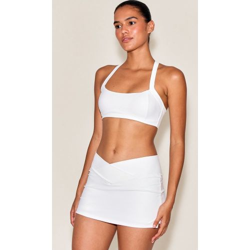 Jupe-short en Sculpt à taille croisée | Taille Large - PrettyLittleThing - Modalova