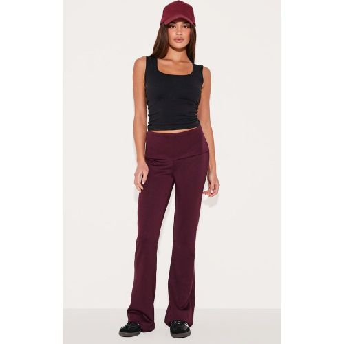 Pantalon de yoga flare doux deluxe replié - PrettyLittleThing - Modalova