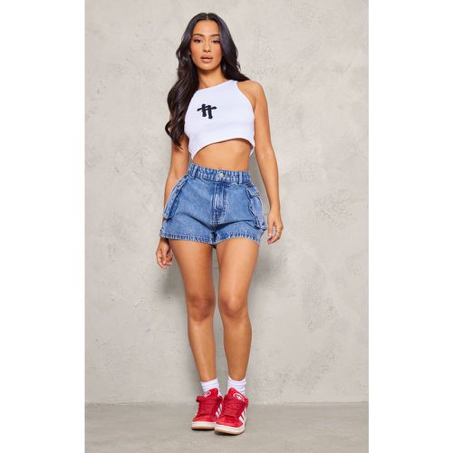 Petite Short en jean à poches - PrettyLittleThing - Modalova