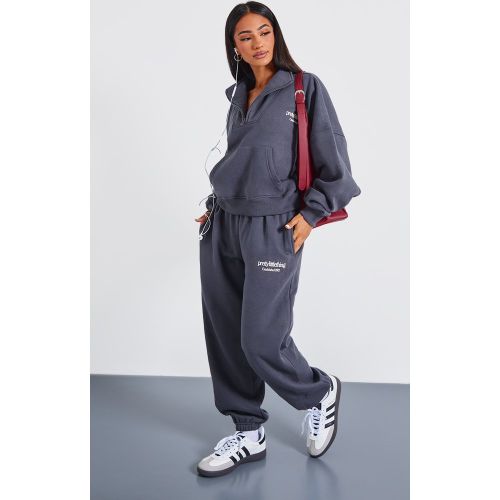 Petite Jogging resserré aux chevilles à slogan - PrettyLittleThing - Modalova