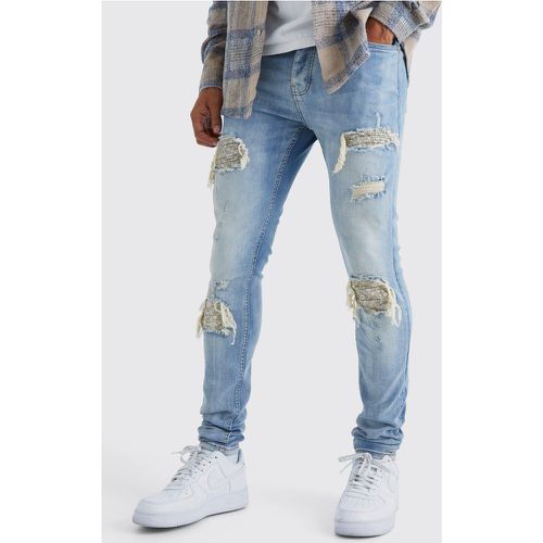 Jean biker skinny à déchirures - 34R - Boohooman - Modalova