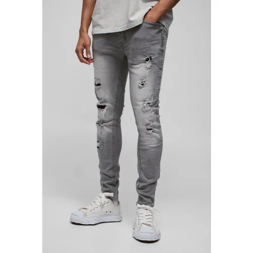 Jean skinny stretch déchiré - 30R - Boohooman - Modalova