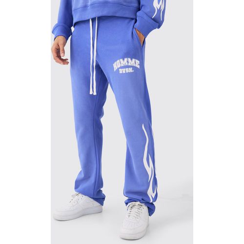 Jogging slim flare délavé à slogan - S - Boohooman - Modalova