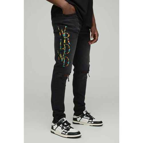 Jean skinny déchiré à écussons - 28R - Boohooman - Modalova