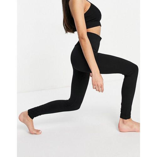 Legging d'ensemble de yoga sans coutures en tissu recyclé - & Other Stories - Modalova