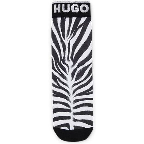Chaussettes courtes à motif animalier et logo - HUGO - Modalova
