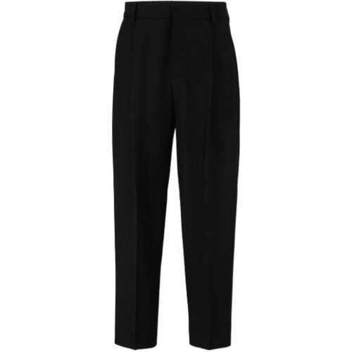 Pantalon Slim Fit en laine mélangée stretch performante - HUGO - Modalova