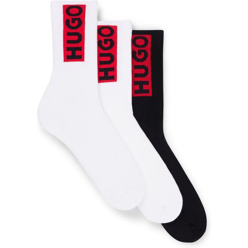 Lot de trois paires de chaussettes basses avec étiquette logo rouge - HUGO - Modalova