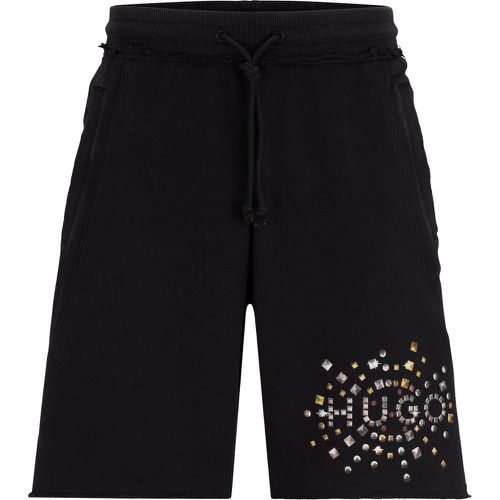 Short en molleton de coton avec motif artistique à effet clouté - HUGO - Modalova