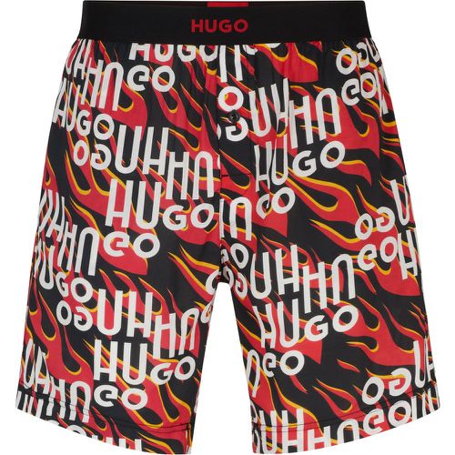 Short de pyjama en coton à logo imprimé intégral - HUGO - Modalova