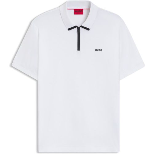 Polo en piqué de coton avec logo contrastant - HUGO - Modalova