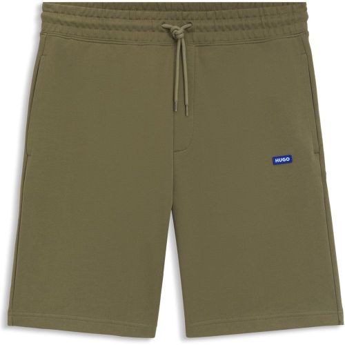 Short en molleton de coton avec cordon de serrage et étiquette logotée bleue - HUGO - Modalova