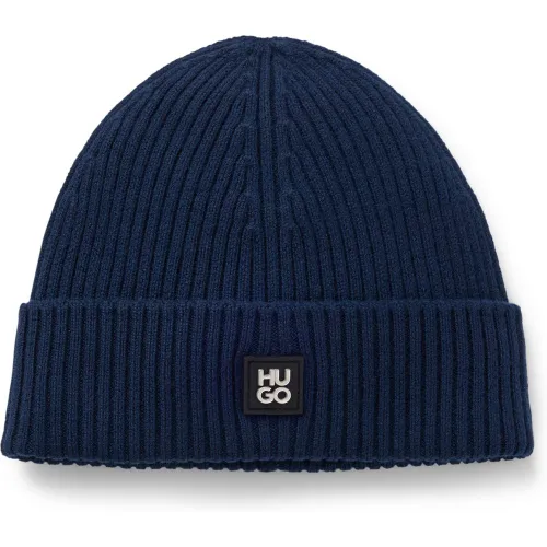 Bonnet en laine vierge avec badge à logo revisité - HUGO - Modalova