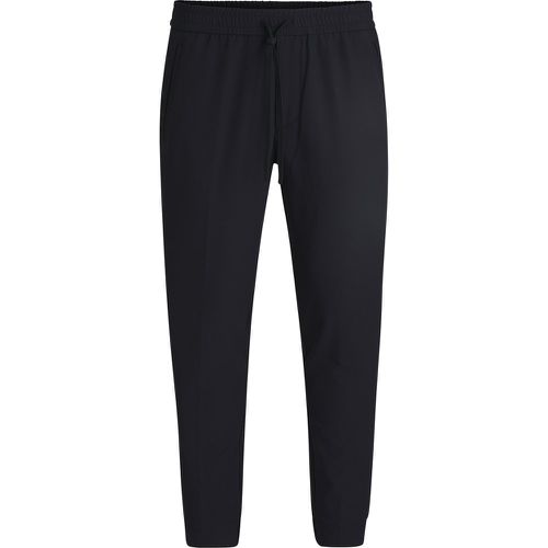 Pantalon Tapered en tissu stretch déperlant - Boss - Modalova