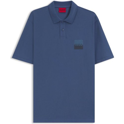 Polo Relaxed en coton avec logo revisité - HUGO - Modalova