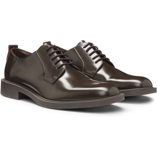 Chaussures derby en cuir avec détail logoté - HUGO - Modalova