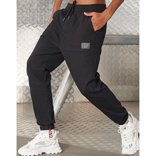 Pantalon de jogging à applique à cordon - SHEIN - Modalova