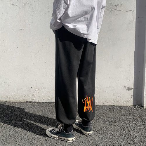 Pantalon avec imprimé flamme - SHEIN - Modalova