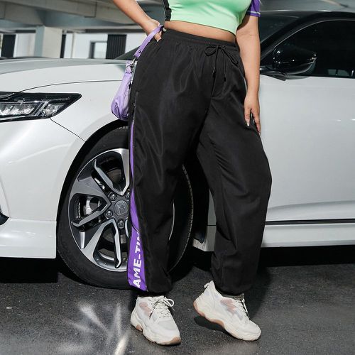 Pantalon de sport à lettres zippé à cordon - SHEIN - Modalova