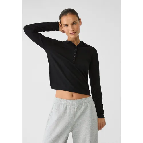 Pull polo en maille avec boutons S - Stradivarius - Modalova