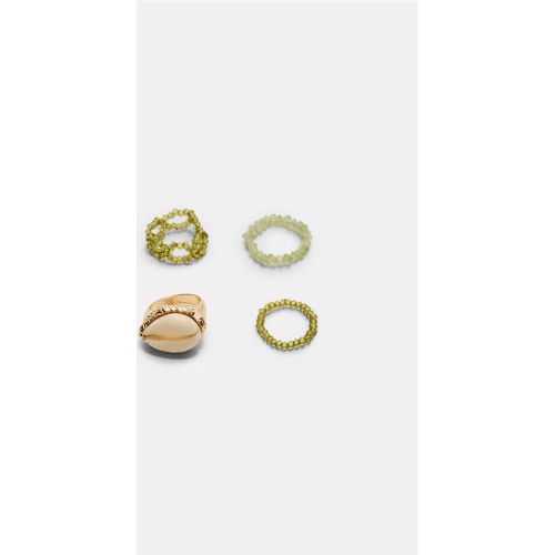 Set de 4 bagues coquillages assorties OS - Stradivarius - Modalova